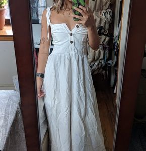 White jumpsuit with button up front